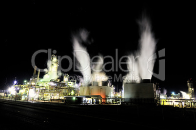 Dramatic image of industrial plant at night