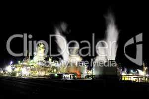 Dramatic image of industrial plant at night