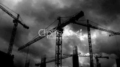 Time-lapse cranes tower cranes (black and white)