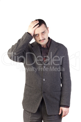 Portrait of depressed young businessman