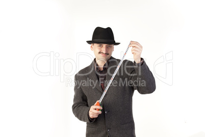 Man in hat with ruler