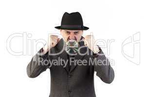 Man in hat biting a compact disc