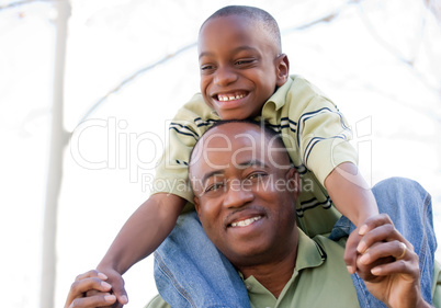 African American Man and Child Having Fun