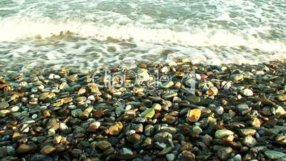 Waves washing onto pebble beach 2