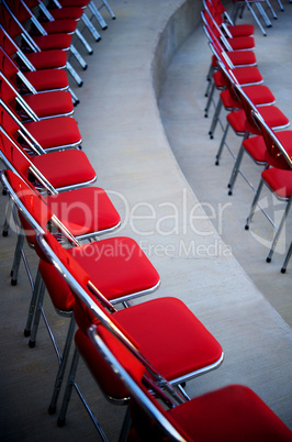 Perfect rows of red chairs