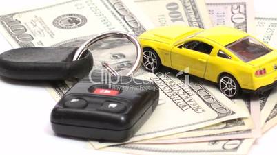 Geldscheine und Modellauto