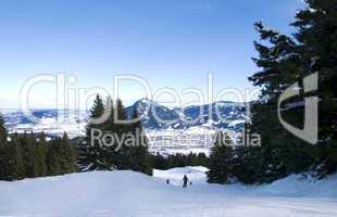 people skiing in the bavarian alps
