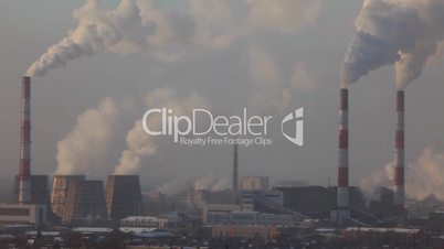 Pipe with smoke in winter sunrise time lapsePipe with smoke in winter sunrise time lapse