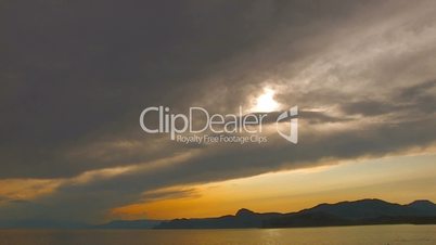 HD sea and rocks at sunset with clouds timelapse