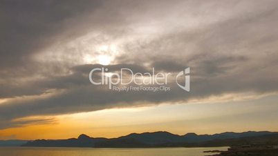 HD panorama of sea and rocks at sunset with clouds