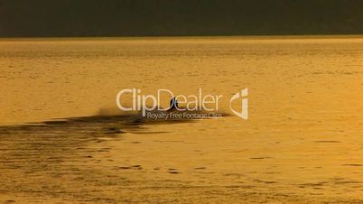 HD Jet Boat in the sea at sunset