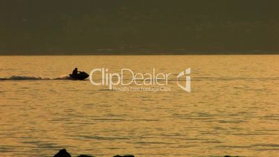 HD Jet Boat in the sea at sunset