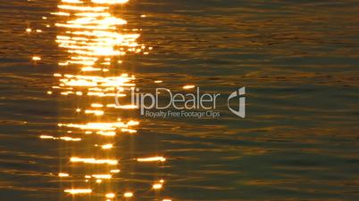 HD sea surface at sunset, closeup