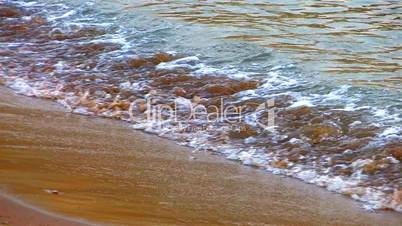 HD Waves running over beach, closeup