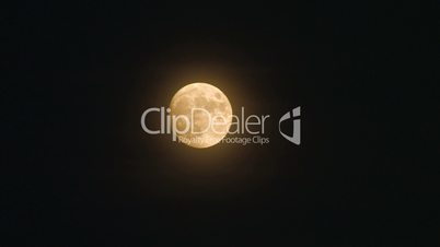 HD Full moon on dark sky, timelapse