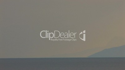 HD Panorama of sea and rocks at sunset with clouds