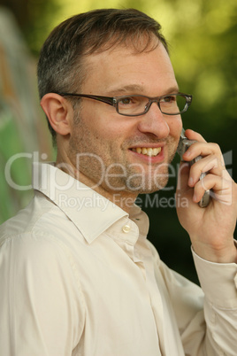 grizzled man on phone