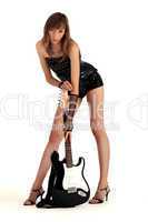 woman posing with rock guitar