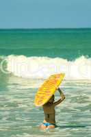 Woman holding boogie board