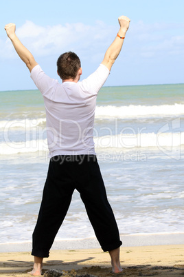 Man doing sport on the beach