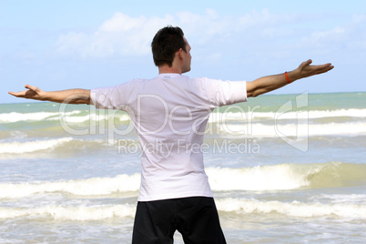 man doing sport on the beach