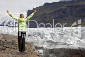 Woman Hiker Celebrating Arms Raised By Vatnajokull Glacier Icela