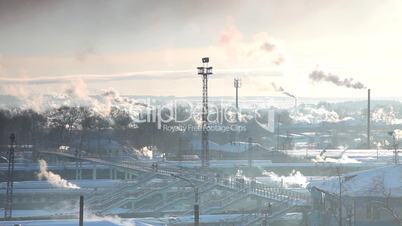 rail station in sunny winter with smoke time lapse