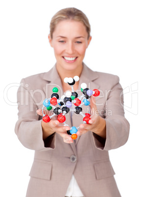 Assertive businesswoman showing a molecule