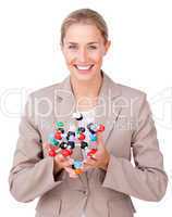 Young businesswoman holding a molecule