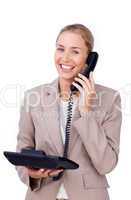 Self-assured businesswoman on phone
