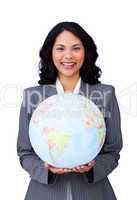 Visionary young businesswoman smiling at global business