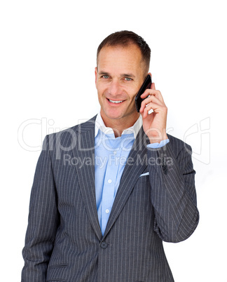 Charismatic attractive businessman using a mobile phone