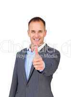 Cheerful businessman with thumb up