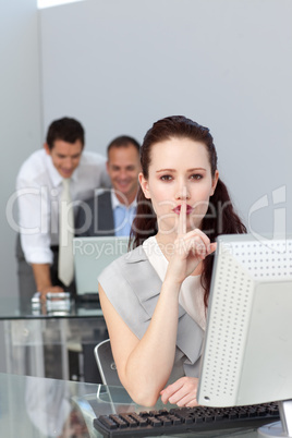 businesswoman asking for silence