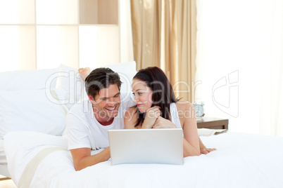 couple using a laptop