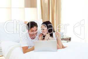 couple using a laptop