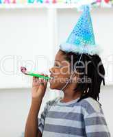 Jolly boy having fun at a birthday party