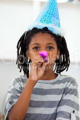 Portrait of a little boy at a birthday party