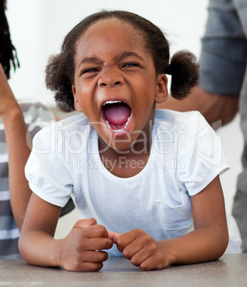 Angry little girl shouting