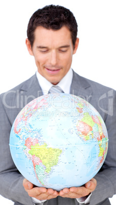 businessman holding a terrestrial globe