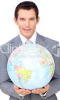 businessman holding a terrestrial globe