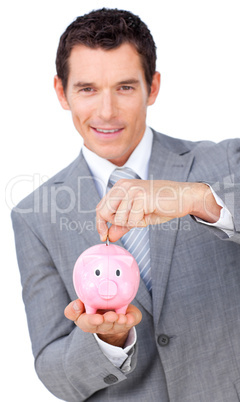 businessman saving money in a piggybank