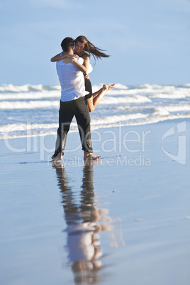 Man and Woman Couple Having In Romantic Embrace On Beach