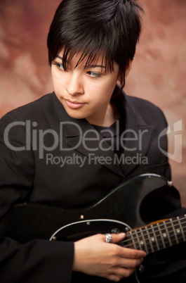 Multiethnic Girl Poses with Electric Guitar