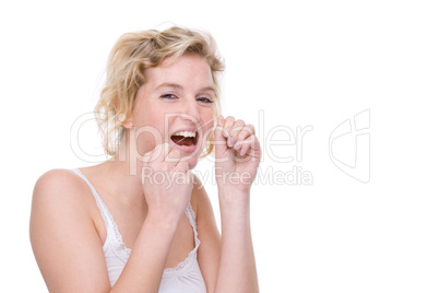 Woman with dental floss