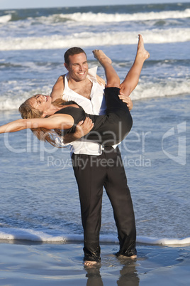 Man and Woman Couple Having Romantic Fun On Beach
