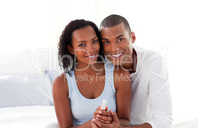 Jolly couple finding out results of a pregnancy test