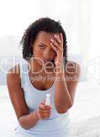 Diconcerted woman finding out results of a pregnancy test