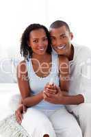 Smiling Afro-american couple finding out results of a pregnancy