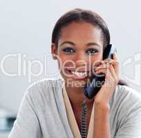 Close-up of an Afro-american businesswoman talking on a phone